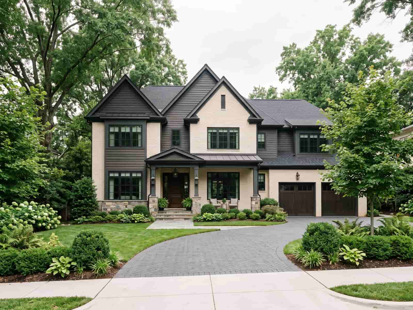 A modern transitional home framed by mature trees